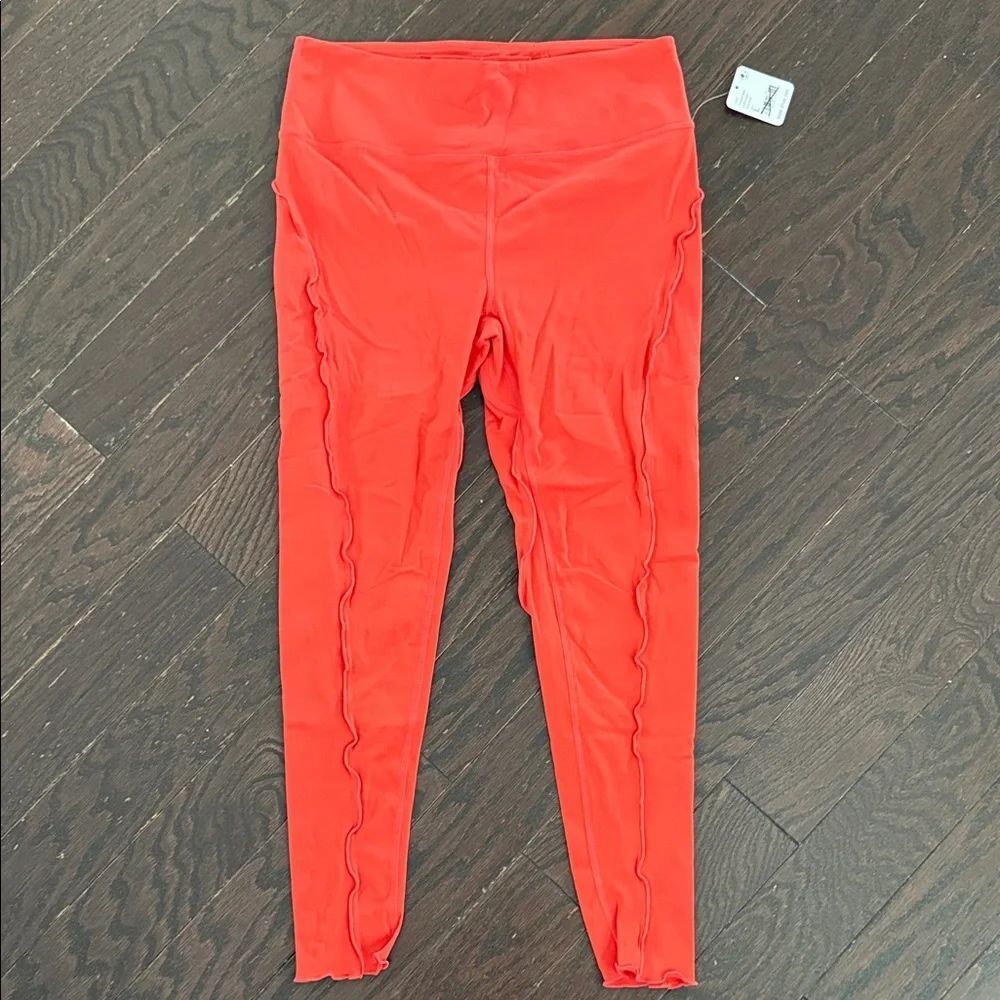 NWT Free People Movement Bright Orange Ruffle Leggings Size L